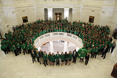 Hundreds of 4-H members all wearing green gathered in the Arkansas Capitol rotunda