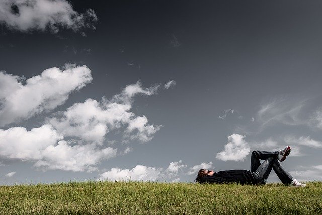 lying in grass, looking at sky