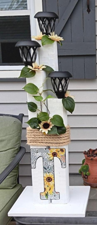 Photo of a colorfully decorated solar porch light.